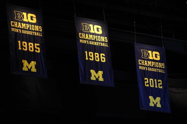 A 2012 B1G Ten champions banner hangs from the rafters at Crisler Center on Tuesday night. Melanie Maxwell I AnnArbor.com
